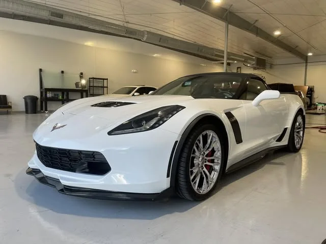 White Corvette Z06 in the bay after a 5 year ceramic coating